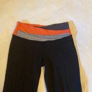 Lulu lemon pants small flare leg, two tone top band, sits lower (not high rise)